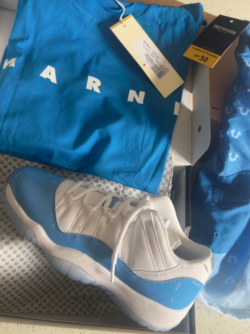 Jordan Blue and White Low-Top Sneakers